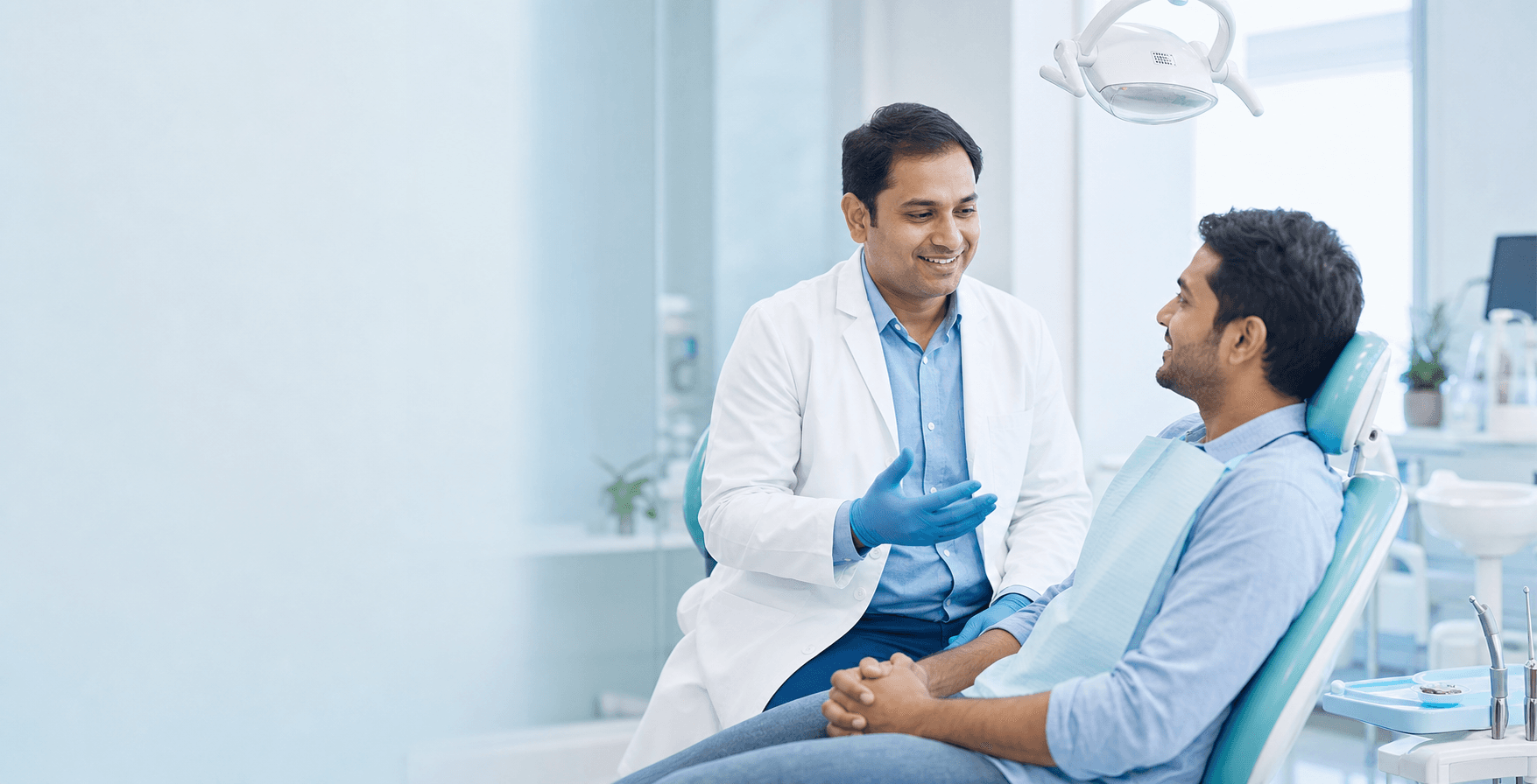 Dental surgeon consulting with a patient at Bhanushree Dental Centre